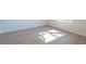 Vacant room featuring wood floors and a bright window at 1045 Morningside Dr, Eustis, FL 32726