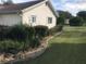 Well-maintained backyard with lush landscaping, green lawn, and a peaceful ambiance at 10839 Sw 78Th Ct, Ocala, FL 34476