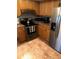 Beautiful kitchen featuring stainless steel appliances, granite countertops, and ample cabinet storage at 10839 Sw 78Th Ct, Ocala, FL 34476