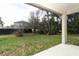 View of the spacious backyard from the covered patio at 1090 Parnell Ct, Deltona, FL 32738