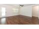 Light filled living room that features hardwood floors and natural light at 1090 Parnell Ct, Deltona, FL 32738
