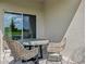 Covered patio with outdoor seating and a view to the backyard at 1128 Clay Blvd, Tavares, FL 32778