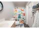 Charming bathroom featuring a playful shower curtain and a modern vanity at 1262 Stonewater Cir, Ocoee, FL 34761