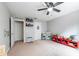 Bright bedroom with neutral walls, a ceiling fan, and lots of space for activities at 1262 Stonewater Cir, Ocoee, FL 34761