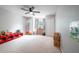 Cozy bedroom with neutral walls, a ceiling fan, and lots of space for activities at 1262 Stonewater Cir, Ocoee, FL 34761