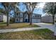 Wonderful two-story home with a three-car garage, big windows, and a well-kept front yard at 1262 Stonewater Cir, Ocoee, FL 34761