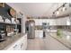 Well-appointed kitchen featuring a large island, stainless steel appliances, and ample countertop space at 1262 Stonewater Cir, Ocoee, FL 34761