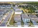 High angle capture of a residential neighborhood with well-maintained lawns, sidewalks, and close proximity to local amenities at 178 Marcello Blvd, Kissimmee, FL 34746