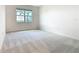 Bedroom featuring carpeted floors and a window for natural light at 178 Marcello Blvd, Kissimmee, FL 34746