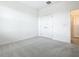Cozy bedroom with carpet flooring and a double door closet at 178 Marcello Blvd, Kissimmee, FL 34746