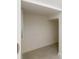 Walk-in closet features tiled floor and ample room for storage and organization at 178 Marcello Blvd, Kissimmee, FL 34746