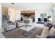 Open concept living room with a dining area and gourmet kitchen making this a desirable space for entertaining and comfort at 178 Marcello Blvd, Kissimmee, FL 34746