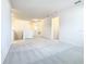 Bright, open loft area with neutral tones and plush carpeting for flexible living at 178 Marcello Blvd, Kissimmee, FL 34746