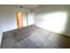 Neutral bedroom with carpet flooring, natural light, and white trim at 2877 Sunridge Loop, St Cloud, FL 34771