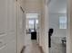 Hallway showcasing carpet floor and doorways to other rooms at 2916 Satire St, Kissimmee, FL 34746