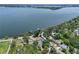 Aerial view showcases the home's proximity to a large body of water at 2929 Lakeshore Dr, Mount Dora, FL 32757