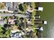 Aerial shot of residences with boat docks on a lake, highlighting convenient waterfront access and neighborhood at 2929 Lakeshore Dr, Mount Dora, FL 32757