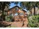 Inviting backyard with a spacious wooden deck perfect for outdoor dining and relaxing at 2929 Lakeshore Dr, Mount Dora, FL 32757