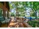 Relaxing outdoor deck area with comfortable seating and serene views of the surrounding landscape at 2929 Lakeshore Dr, Mount Dora, FL 32757