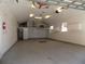 Spacious two-car garage offering ample space and overhead lighting at 2929 Lakeshore Dr, Mount Dora, FL 32757