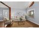 Bright living room featuring modern decor, natural light, and hardwood flooring at 2929 Lakeshore Dr, Mount Dora, FL 32757