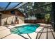 Inviting screened-in pool area with plenty of space for outdoor activities and relaxation at 2929 Lakeshore Dr, Mount Dora, FL 32757