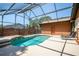 Enjoy a private screened-in pool area, perfect for relaxation and outdoor enjoyment at 2929 Lakeshore Dr, Mount Dora, FL 32757