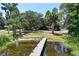 Beautiful lakefront property with a dock, perfect for enjoying the natural surroundings at 2929 Lakeshore Dr, Mount Dora, FL 32757