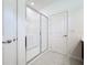 Clean and modern bathroom with a glass-enclosed shower, providing a refreshing and stylish space at 299 Marcello Blvd, Kissimmee, FL 34746