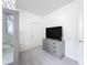Cozy bedroom with neutral gray walls, bunk beds and soft carpeting at 299 Marcello Blvd, Kissimmee, FL 34746