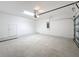 Clean and bright two car garage offering ample space for parking and storage solutions at 299 Marcello Blvd, Kissimmee, FL 34746