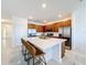 Spacious kitchen with stainless steel appliances, granite countertops and room for barstool seating at 299 Marcello Blvd, Kissimmee, FL 34746