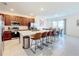 Spacious kitchen featuring a large island with seating, stainless steel appliances, and an open-concept layout at 299 Marcello Blvd, Kissimmee, FL 34746