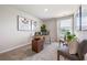 Inviting home office with stylish desk, comfortable seating, and natural light, ideal for productivity at 300 Preston Cove Dr, St Cloud, FL 34771