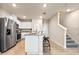 Well-equipped kitchen with stainless appliances, a center island, and tiled floors at 300 Preston Cove Dr, St Cloud, FL 34771