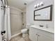 Well-maintained bathroom featuring a shower and vanity with ample lighting and neutral decor at 3016 Parkway Blvd # 110, Kissimmee, FL 34747