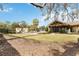 Lush community grounds with manicured lawn, a pool, and outdoor lounging areas at 34429 Alameda Dr, Sorrento, FL 32776