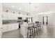 Beautiful kitchen with stainless appliances, a breakfast bar and pendant lighting at 42 Willow Ln, Poinciana, FL 34759