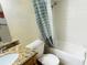 Bathroom featuring vanity with granite countertop, shower and tub combination at 4759 S Texas Ave # 4759C, Orlando, FL 32839