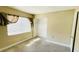 Bedroom with carpet flooring, ample natural light, and neutral paint at 4759 S Texas Ave # 4759C, Orlando, FL 32839