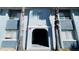Building entrance featuring address with a covered entrance and dual palm trees at 4759 S Texas Ave # 4759C, Orlando, FL 32839