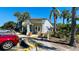 Clubhouse featuring manicured landscaping, covered entrance and ample parking at 4759 S Texas Ave # 4759C, Orlando, FL 32839