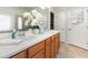 Spacious bathroom with double vanity, white countertops, and modern fixtures at 569 Vista Sol Dr, Davenport, FL 33837