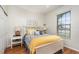 Cozy bedroom featuring a comfortable bed and ample natural light at 569 Vista Sol Dr, Davenport, FL 33837