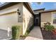 Inviting entryway showing brick pavers, dark stucco, and a sidelight at 569 Vista Sol Dr, Davenport, FL 33837