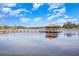 Lake view with community pier and gazebo at 569 Vista Sol Dr, Davenport, FL 33837