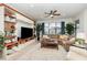 Spacious living room with built-in shelving and modern furniture at 569 Vista Sol Dr, Davenport, FL 33837