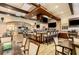 Community restaurant bar with large-screen TVs, seating, and a fully stocked bar at 569 Vista Sol Dr, Davenport, FL 33837