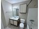 Cozy bathroom featuring a vanity with a mirror, toilet, tub, and a shower at 629 Dory Ln # 202, Altamonte Springs, FL 32714