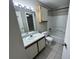 Bathroom features tiled floors, vanity with mirror, toilet, tub, and shower at 629 Dory Ln # 202, Altamonte Springs, FL 32714